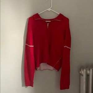 Slightly cropped red sweater